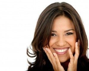 Female client smiling after getting composite dental bonding in South Ogden