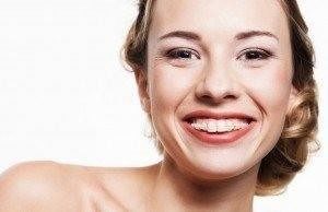 woman-wearing-invisalign-from-her-orthodontics-service